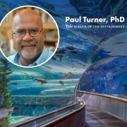 A portrait of Paul Turner, PhD, of the Yale School of the Environment set over a photograph of the aquarium's underwater viewing tunnel.