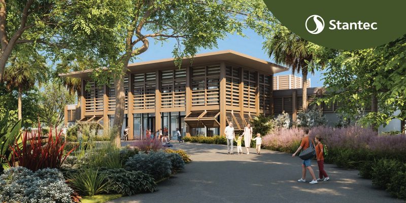 Architectural rendering of Zoo Miami's planned animal hospital, a low building with wooden louvered screens, surrounded by tropical planting and a guest pathway.