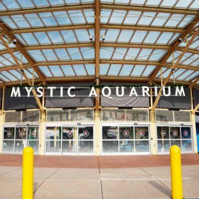 The entrance to Mystic Aquarium on a clear day