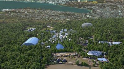 An aerial rendering of the planned Zoo Zurich site looking toward the lake