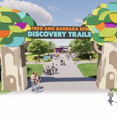Rendering of the Fred and Barbara Erb Discovery Trails entrance arch with stylized trees and visitors walking through