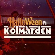 Promotional key art for Halloween at Kolmarden: a performer in a red and black harlequin costume hangs upside down from an aerial rig against a dark purple night sky lit with orange sparks, with the words Halloween pa Kolmarden set across the center in orange and white lettering.