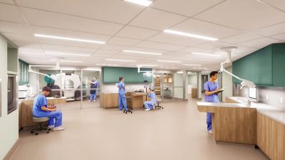 Architectural rendering of the Tennessee Aquarium's planned animal hospital: a bright treatment room with staff in blue scrubs, overhead surgical lights, teal cabinetry and a glass-walled imaging suite holding a CT scanner.