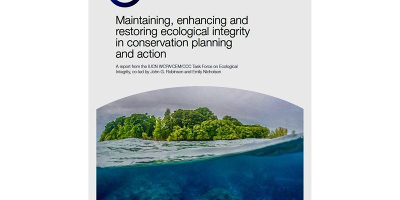 Cover of the IUCN technical report on ecological integrity, showing a split-level photograph of a small forested island in the Solomon Islands with the coral reef visible in the clear water beneath the surface.