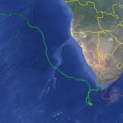 Satellite tracks of two rehabilitated sea turtles released off South Africa, one running north and west across the Atlantic and the other looping east into the Indian Ocean.